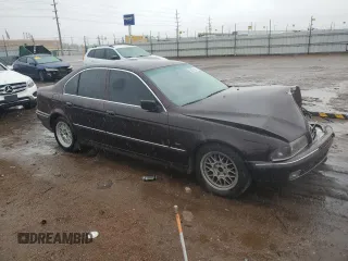 2000 BMW 5 Series 528i z VIN WBADM6341YGU26450, wystawiony jako Copart lot #55831915 z przebiegiem 136 499 mil mil oraz Szkoda całkowita • Salvage title. Historia ofert i sprzedaży dostępna na DreamBid. Obrazek 4.