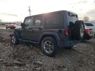 2018 Jeep Wrangler JK Unlimited Sport S with VIN 1C4BJWDG9JL882737, listed as a Copart auction lot 85765184 with 60,578 mi miles and Salvage Title. Bid and sale history available at carsss.com. Image 2.