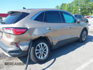 2021 Ford Escape SE with VIN 1FMCU0G67MUA00194, listed as a IAAI auction lot 42406942 with 62,553 mi miles and . Bid and sale history available at DreamBid. Image 6.