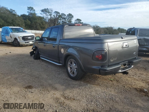 2002 Ford F-150 Harley Davidson with VIN 1FTRW07302KD36843, listed as a Copart auction lot 46342835 with 177,536 mi miles and Salvage Title. Bid and sale history available at carsss.com. Image 2.