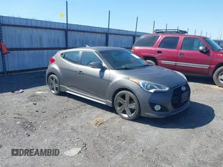 2014 Hyundai Veloster Turbo with VIN KMHTC6AE3EU196500, listed as a IAAI auction lot 41765426 with 132,913 mi miles and . Bid and sale history available at DreamBid. Image 1.
