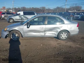 2002 Honda Civic LX with VIN 2HGES16602H581131, listed as a IAAI auction lot 40993388 with 116,663 mi miles. Bid and sale history available at carsss.com. Image 14.