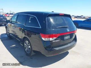 2016 Honda Odyssey Touring Elite with VIN 5FNRL5H95GB045915, listed as a IAAI auction lot 41869980 with 160,270 mi miles. Bid and sale history available at carsss.com. Image 3.