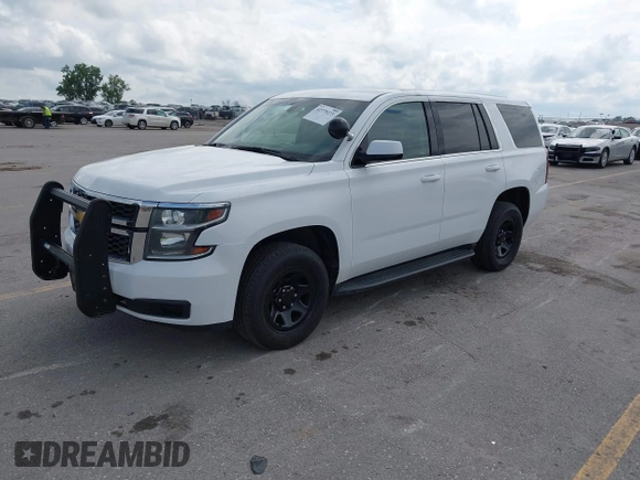 2018 Chevrolet Tahoe Commercial z VIN 1GNSKDEC8JR242164, wystawiony jako IAAI lot #42779273 z przebiegiem 134 654 mil mil oraz . Historia ofert i sprzedaży dostępna na DreamBid. Obrazek 18.