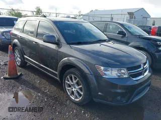 2014 Dodge Journey SXT with VIN 3C4PDCBB3ET172374, listed as a IAAI auction lot 42188228 with 138,129 mi miles. Bid and sale history available at carsss.com. Image 1.