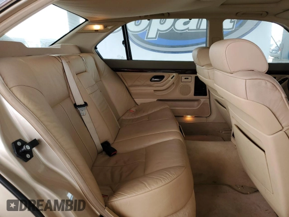 1998 BMW 7 Series 740il with VIN WBAGJ832XWDM11394, listed as a Copart auction lot 54390685 with 126,828 mi miles and Clean Title. Bid and sale history available at carsss.com. Image 10.