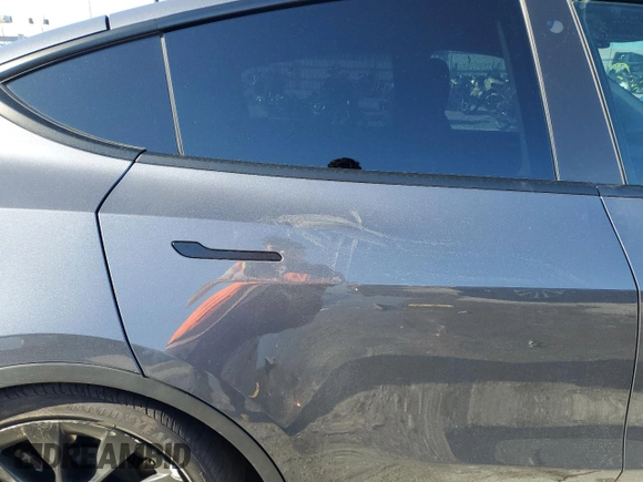 2023 Tesla Model Y Long Range with VIN 7SAYGDEE2PA047794, listed as a Copart auction lot 48397305 with 18,850 mi miles and Salvage Title. Bid and sale history available at DreamBid. Image 11.