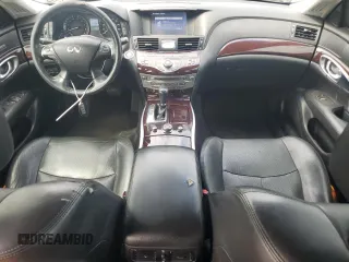 2014 Infiniti Q70 z VIN JN1BY1AP5EM260240, wystawiony jako Copart lot #53209505 z przebiegiem 72 105 mil mil oraz Tytuł czysty. Historia ofert i sprzedaży dostępna na DreamBid. Obrazek 8.