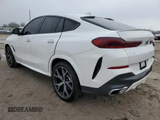 2021 BMW X6 sDrive40i z VIN 5UXCY4C08M9F34312, wystawiony jako Copart lot #87206474 z przebiegiem 67 851 mil mil oraz Czysty tytuł • Clean title. Historia ofert i sprzedaży dostępna na DreamBid. Obrazek 2.