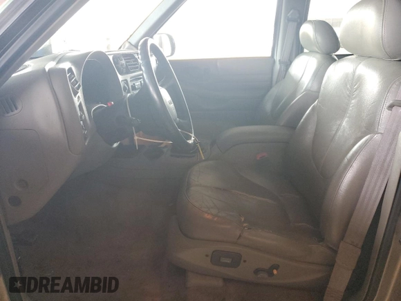2000 GMC Jimmy SLE Convenience z VIN 1GKDT13W7Y2384460, wystawiony jako Copart lot #85545254 z przebiegiem 165 787 mil mil oraz Czysty tytuł • Clean title. Historia ofert i sprzedaży dostępna na DreamBid. Obrazek 7.