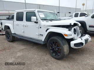 2023 Jeep Gladiator High Altitude z VIN 1C6HJTFG0PL564933, wystawiony jako IAAI lot #42652584 z przebiegiem 60 075 mil mil oraz . Historia ofert i sprzedaży dostępna na DreamBid. Obrazek 1.