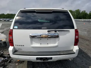 2007 Chevrolet Tahoe LTZ z VIN 1GNFC13J07R177477, wystawiony jako Copart lot #56707715 z przebiegiem 222 879 mil mil oraz Szkoda całkowita • Salvage title. Historia ofert i sprzedaży dostępna na DreamBid. Obrazek 6.