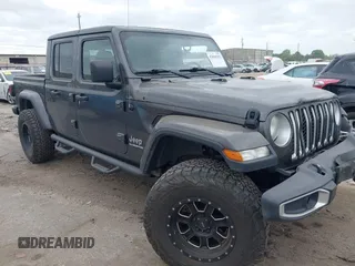 2020 Jeep Gladiator Overland z VIN 1C6HJTFG8LL166086, wystawiony jako IAAI lot #42016222 z przebiegiem 102 232 mil mil oraz . Historia ofert i sprzedaży dostępna na DreamBid. Obrazek 1.