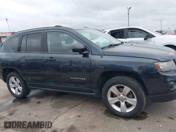 2014 Jeep Compass Sport with VIN 1C4NJCBB0ED647937, listed as a IAAI auction lot 41444062 with 135,679 mi miles and . Bid and sale history available at DreamBid. Image 13.