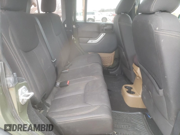 2015 Jeep Wrangler Unlimited Rubicon with VIN 1C4BJWFG3FL667908, listed as a Copart auction lot 89116445 with 75,996 mi miles and Salvage title. Bid and sale history available at DreamBid. Image 10.