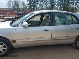 2003 Buick Park Avenue with VIN 1G4CW54K334100140, listed as a IAAI auction lot 41874244 with 85,201 mi miles. Bid and sale history available at carsss.com. Image 6.