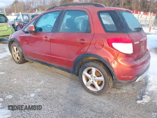 2007 Suzuki SX4 with VIN JS2YB413775111452, listed as a IAAI auction lot 41258800 with 171,145 mi miles. Bid and sale history available at carsss.com. Image 3.
