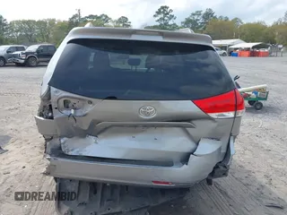 2012 Toyota Sienna XLE AAS with VIN 5TDYK3DC4CS251821, listed as a IAAI auction lot 41932724 with 149,395 mi miles. Bid and sale history available at carsss.com. Image 16.