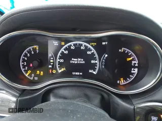 2014 Jeep Grand Cherokee Overland with VIN 1C4RJFCG9EC460165, listed as a IAAI auction lot 42092137 with 131,802 mi miles and . Bid and sale history available at DreamBid. Image 7.