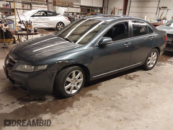2005 Acura TSX with VIN JH4CL96975C034682, listed as a IAAI auction lot 41596405 with 228,889 mi miles and . Bid and sale history available at DreamBid. Image 18.