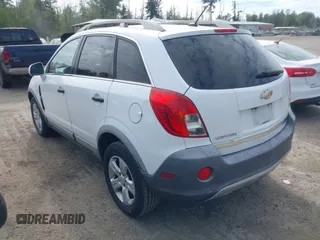 2014 Chevrolet Captiva Sport LS z VIN 3GNAL2EK7ES547033, wystawiony jako IAAI lot #42206186 z przebiegiem 196 530 mil mil oraz . Historia ofert i sprzedaży dostępna na DreamBid. Obrazek 3.