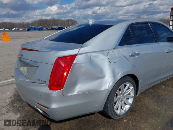 2015 Cadillac CTS RWD with VIN 1G6AP5SX5F0115745, listed as a IAAI auction lot 41658935 with 62,477 mi miles and . Bid and sale history available at DreamBid. Image 6.