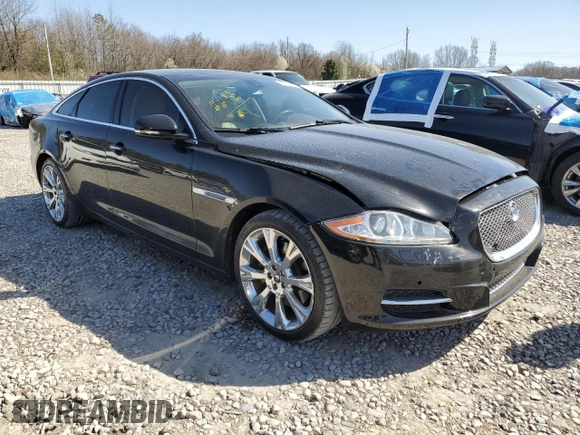 2012 Jaguar XJ with VIN SAJWA1CB5CLV29023, listed as a Copart auction lot 48300165 with 42,725 mi miles and Salvage title. Bid and sale history available at DreamBid. Image 4.