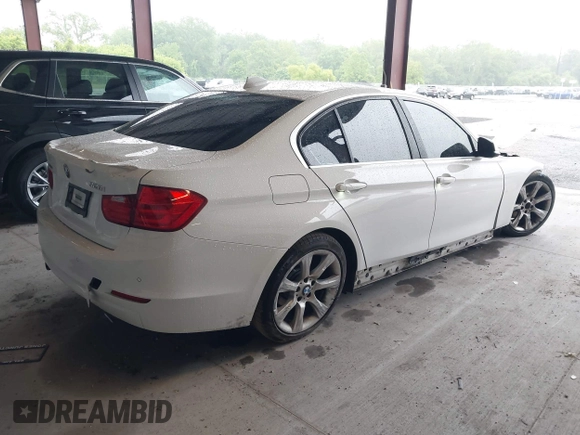 2015 BMW 3 Series 328i xDrive with VIN WBA3B3G55FNR86497, listed as a IAAI auction lot 42350645 with 56,688 mi miles and . Bid and sale history available at DreamBid. Image 4.