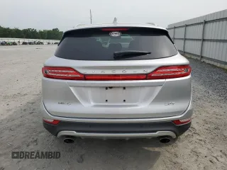 2017 Lincoln MKC Premiere with VIN 5LMCJ1C91HUL32617, listed as a Copart auction lot 57444215 with 106,285 mi miles and Salvage title. Bid and sale history available at DreamBid. Image 6.