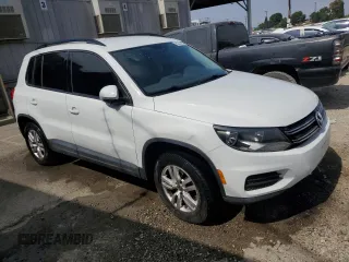 2016 Volkswagen Tiguan S with VIN WVGAV7AX9GW529699, listed as a Copart auction lot 62239475 with 119,075 mi miles and Clean title. Bid and sale history available at DreamBid. Image 4.