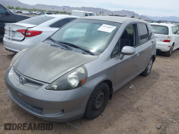 2007 Honda Fit z VIN JHMGD38467S063046, wystawiony jako IAAI lot #42238007 z przebiegiem 171 743 mil mil oraz . Historia ofert i sprzedaży dostępna na DreamBid. Obrazek 2.