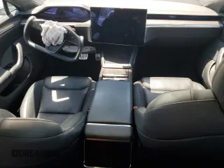 2023 Tesla Model S z VIN 5YJSA1E58PF500032, wystawiony jako Copart lot #57532955 z przebiegiem Nie podano mil oraz Szkoda całkowita • Salvage title. Historia ofert i sprzedaży dostępna na DreamBid. Obrazek 8.