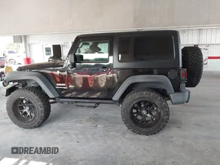 2018 Jeep Wrangler Sport S with VIN 1C4GJWAG3JL927925, listed as a IAAI auction lot 42387748 with 48,447 mi miles and . Bid and sale history available at DreamBid. Image 14.
