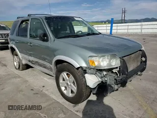 2005 Ford Escape Hybrid z VIN 1FMCU95HX5KE24619, wystawiony jako Copart lot #60624765 z przebiegiem 209 937 mil mil oraz Nie do naprawy • Non repairable. Historia ofert i sprzedaży dostępna na DreamBid. Obrazek 14.