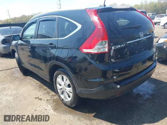 2014 Honda CR-V EX-L with VIN 2HKRM4H76EH673891, listed as a IAAI auction lot 42009693 with 103,798 mi miles. Bid and sale history available at carsss.com. Image 3.
