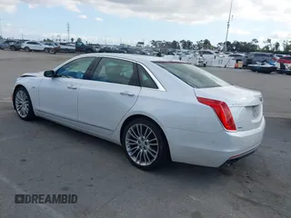 2016 Cadillac CT6 Luxury AWD with VIN 1G6KD5RSXGU154557, listed as a IAAI auction lot 41550199 with 102,536 mi miles and . Bid and sale history available at DreamBid. Image 3.