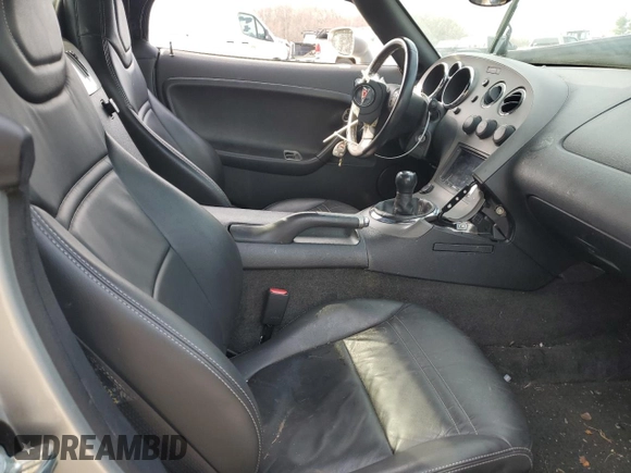 2006 Pontiac Solstice z VIN 1G2MB33B96Y104138, wystawiony jako Copart lot #48909975 z przebiegiem Nie podano mil oraz Szkoda całkowita • Salvage title. Historia ofert i sprzedaży dostępna na DreamBid. Obrazek 10.