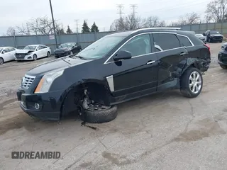 2015 Cadillac SRX Premium Collection with VIN 3GYFNGE37FS556860, listed as a IAAI auction lot 41854634 with 170,808 mi miles and . Bid and sale history available at DreamBid. Image 2.