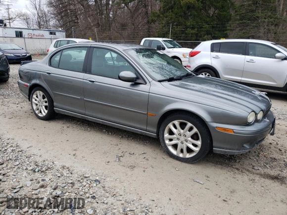 2004 Jaguar X-Type with VIN SAJEA51C24WE00125, listed as a Copart auction lot 49161875 with 80,890 mi miles and Clean Title. Bid and sale history available at DreamBid. Image 4.