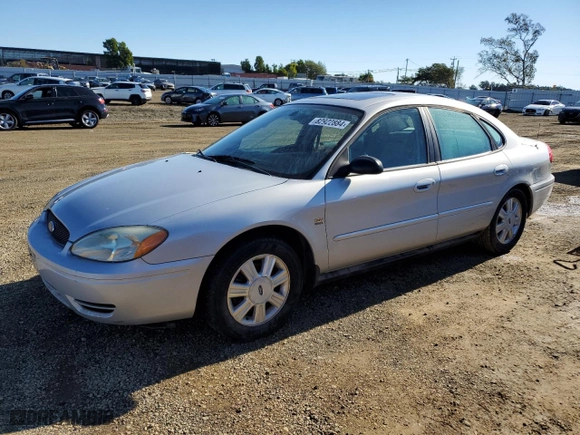2004 Ford Taurus SEL with VIN 1FAHP56S14G141800, listed as a Copart auction lot 82922884 with 87,646 mi miles and Salvage Title. Bid and sale history available at carsss.com. Image 1.