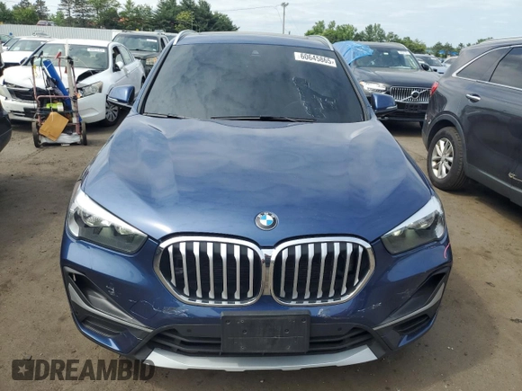 2021 BMW X1 xDrive28i with VIN WBXJG9C0XM5U47141, listed as a Copart auction lot 60645865 with 56,106 mi miles and Salvage title. Bid and sale history available at DreamBid. Image 5.