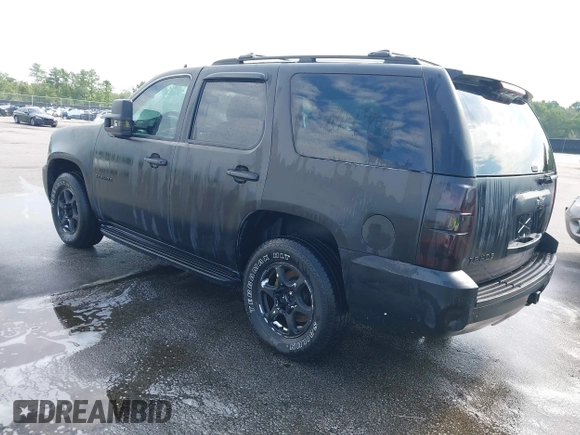 2007 Chevrolet Tahoe LTZ with VIN 1GNFC13J17J149752, listed as a IAAI auction lot 42632542 with 313,740 mi miles and . Bid and sale history available at DreamBid. Image 3.