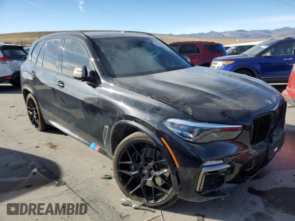 2021 BMW X5 M50i with VIN 5UXJU4C01M9F13949, listed as a Copart auction lot 84485564 with 0 mi miles and Salvage Title. Bid and sale history available at carsss.com. Image 4.