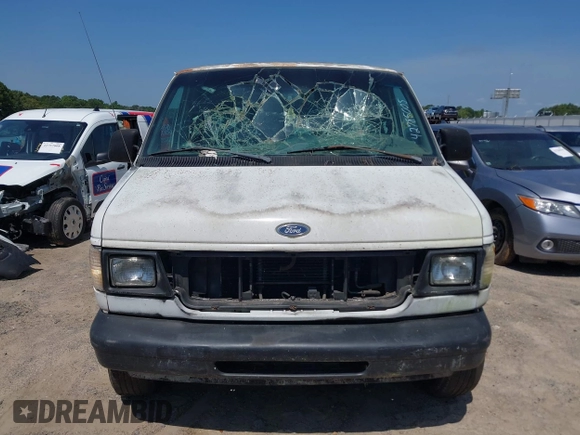 1998 Ford Econoline Cargo with VIN 1FTNS2421WHC08759, listed as a IAAI auction lot 42785005 with Not provided miles and . Bid and sale history available at DreamBid. Image 6.