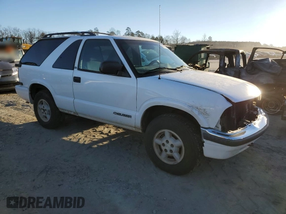 2000 Chevrolet Blazer LS with VIN 1GNCT18W8YK285881, listed as a Copart auction lot 41364325 with 277,029 mi miles and Salvage title. Bid and sale history available at DreamBid. Image 4.