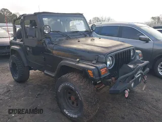 1997 Jeep Wrangler z VIN IJ4FY19S7VP440254, wystawiony jako IAAI lot #41220711 z przebiegiem 218 398 mil mil oraz . Historia ofert i sprzedaży dostępna na DreamBid. Obrazek 1.