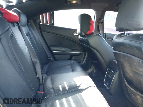 2019 Dodge Charger SXT with VIN 2C3CDXJG4KH710673, listed as a IAAI auction lot 41469797 with 102,011 mi miles and . Bid and sale history available at DreamBid. Image 8.