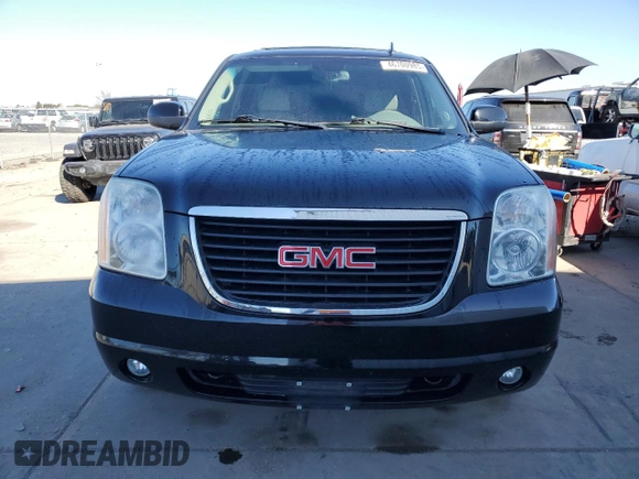 2009 GMC Yukon SLT w/4SB with VIN 1GKFK33059R106202, listed as a Copart auction lot 46700985 with 156,709 mi miles and Salvage Title. Bid and sale history available at carsss.com. Image 5.