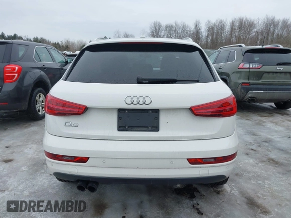 2017 Audi Q3 Premium z VIN WA1BCCFS4HR016424, wystawiony jako IAAI lot #41627278 z przebiegiem 60 028 mil mil oraz . Historia ofert i sprzedaży dostępna na DreamBid. Obrazek 16.