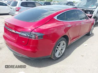 2014 Tesla Model S 60 with VIN 5YJSA1H14EFP63897, listed as a IAAI auction lot 42713272 with Not provided miles and . Bid and sale history available at DreamBid. Image 4.